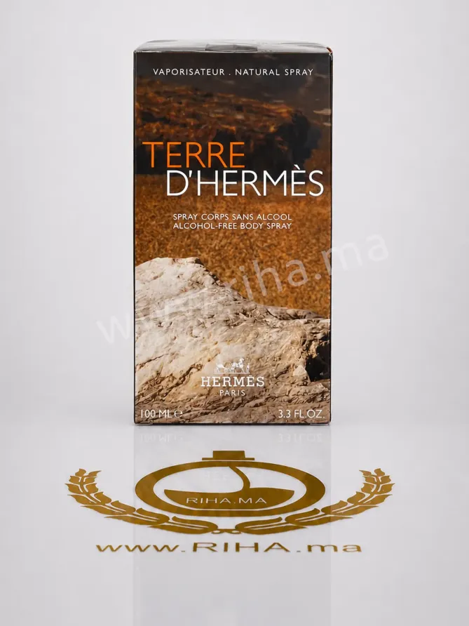 Terre d'Hermès Alcohol-Free Body Spray Flacon de terre dhermes alcohol free body spray 100ml posé sur fond bleu