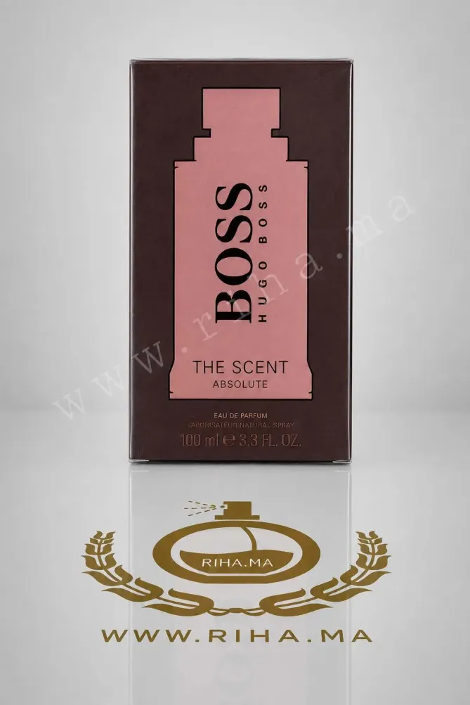 HUO BOSS - BOSS THE SCENT ABSOLUTE POUR HOMME 100ML Flacon de parfum huo boss posé sur un fond sombre élégant