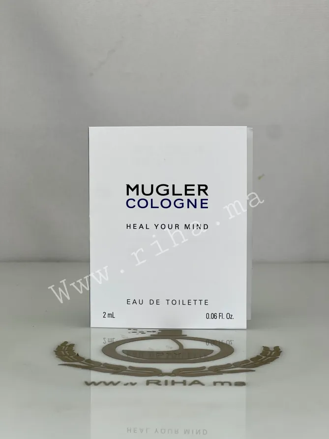 Échantillon Heal Your Mind Mugler Eau De Toilette échantillon heal your mind mugler — Flacon échantillon de parfum Heal Your Mind Mugler posé sur fond bleu