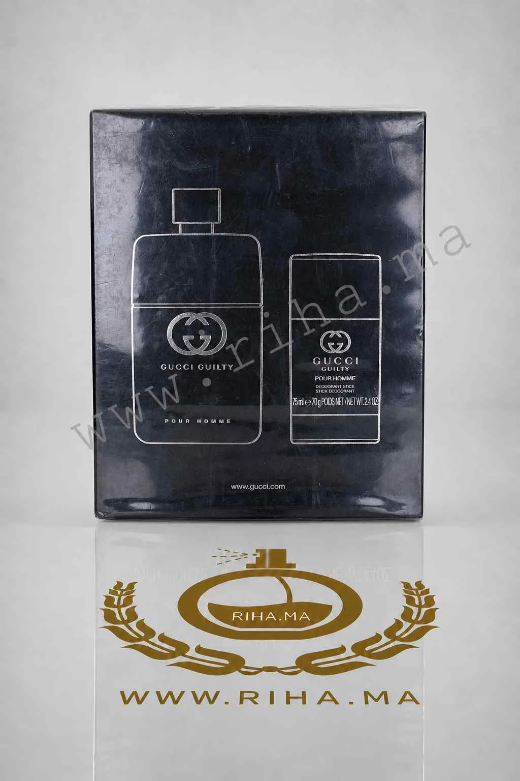 COFFRET GUCCI GUILTY TRAVEL RETAIL EXCLUSIVE EAU DE TOILETTE — photo 2 Coffret Gucci Guilty Travel Retail Exclusive posé sur fond élégant — vue 2