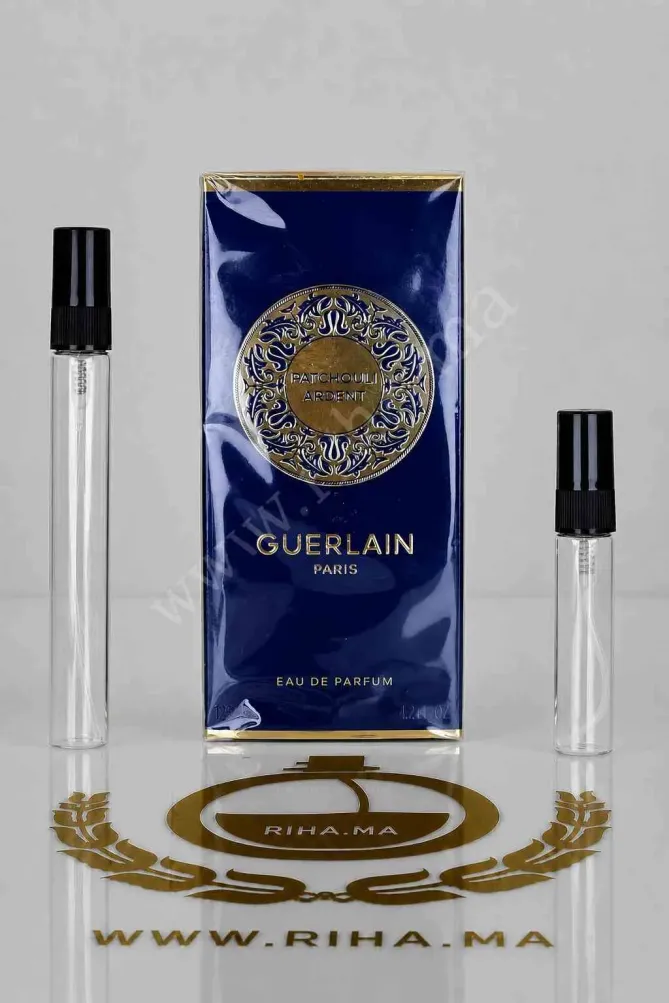 decantage patchouli ardent guerlain — Flacon de décantage Patchouli Ardent Guerlain sur fond noir élégant