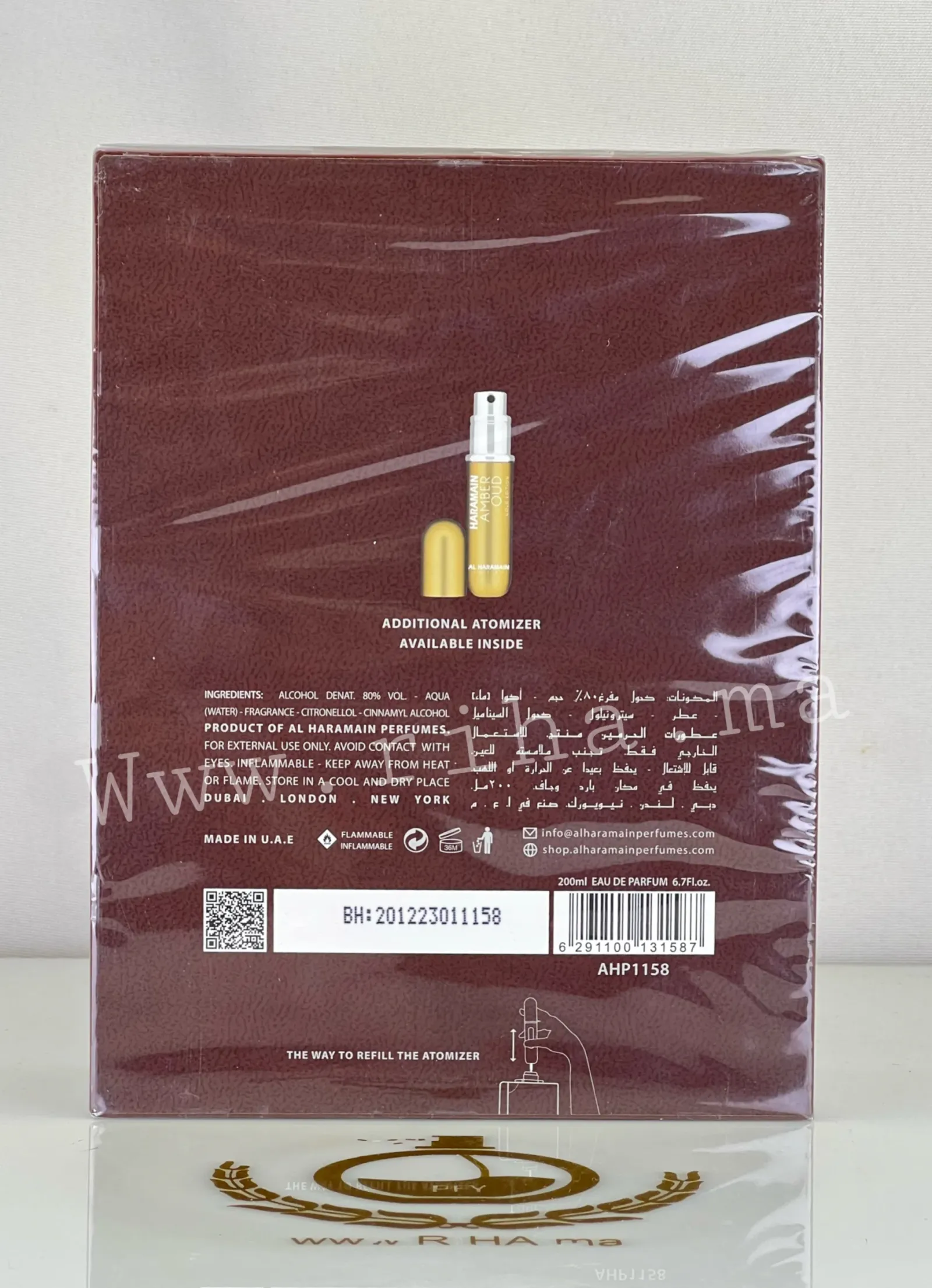 Amber Oud Al Haramain Perfumes Eau De Parfum Pour Homme et Femme 200ML — photo 2 Flacon de amber oud al haramain perfumeseau posé sur fond sombre élégant — vue 2