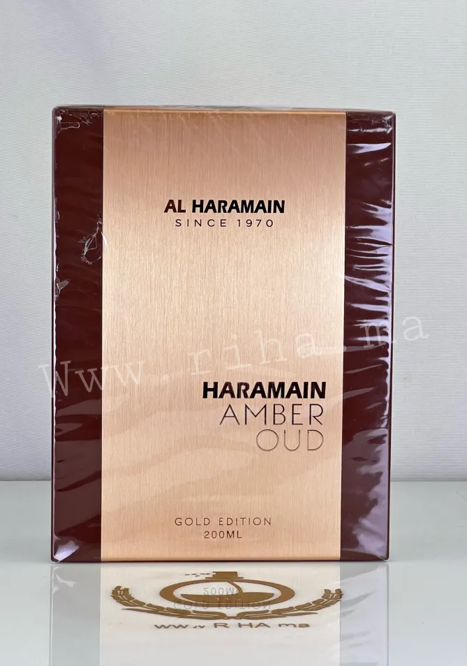 Flacon de amber oud al haramain perfumeseau posé sur fond sombre élégant