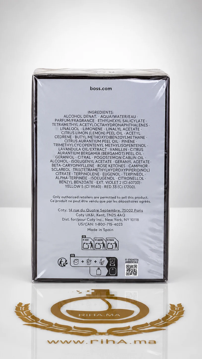 boss man eau de toilette 100ml — photo 2 Flacon de boss man eau de toilette sur fond boisé — vue 2