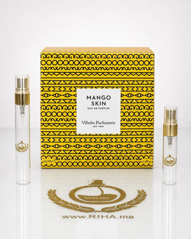 Decantage Mango Skin Vilhelm Parfumerie Eau De Parfum Flacon de decantage mango skin vilhelm parfumerie posé sur fond pastel
