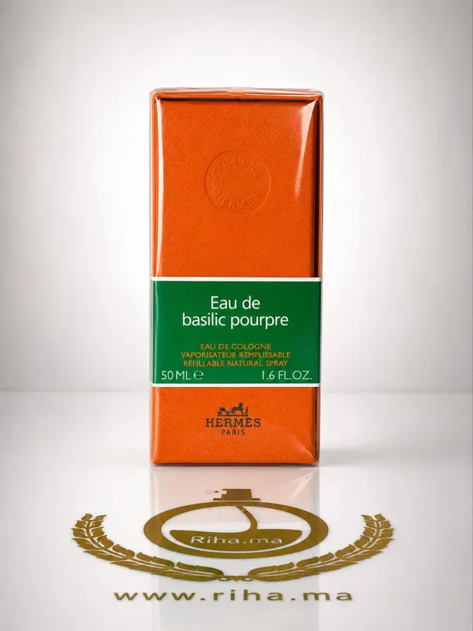 eau de basilic pourpre hermes eau de cologne 100ml Flacon d'eau de basilic pourpre sur fond vert
