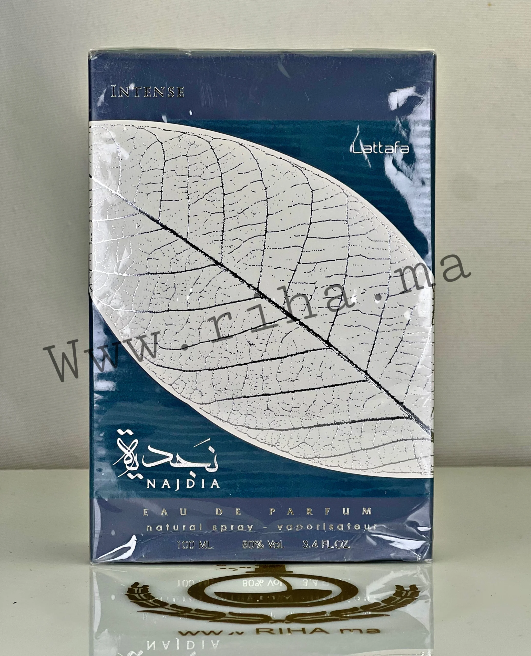 Najdia Intense Lattafa - inspiré de le beau paradise garden Flacon de parfum najdia intense lattafa avec notes de menthe et d'ananas