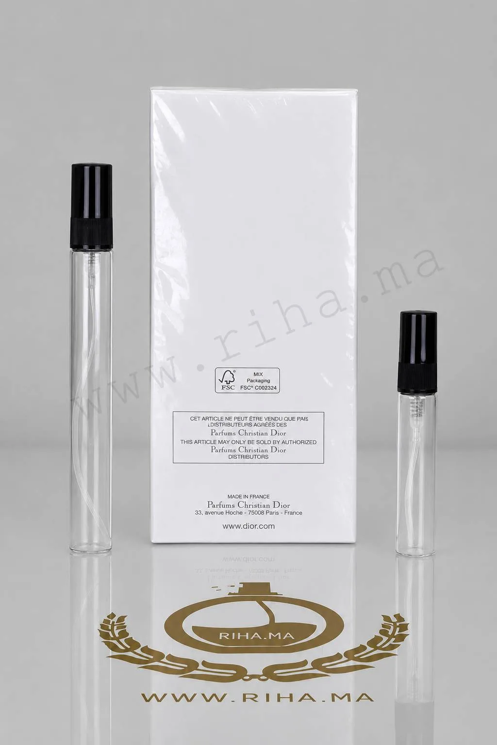 Decantage Dior Homme Sport Dior eau de toilette — photo 2 decantage dior homme sport dior — Petit flacon de décantage Dior Homme Sport Dior posé sur fond blanc — vue 2