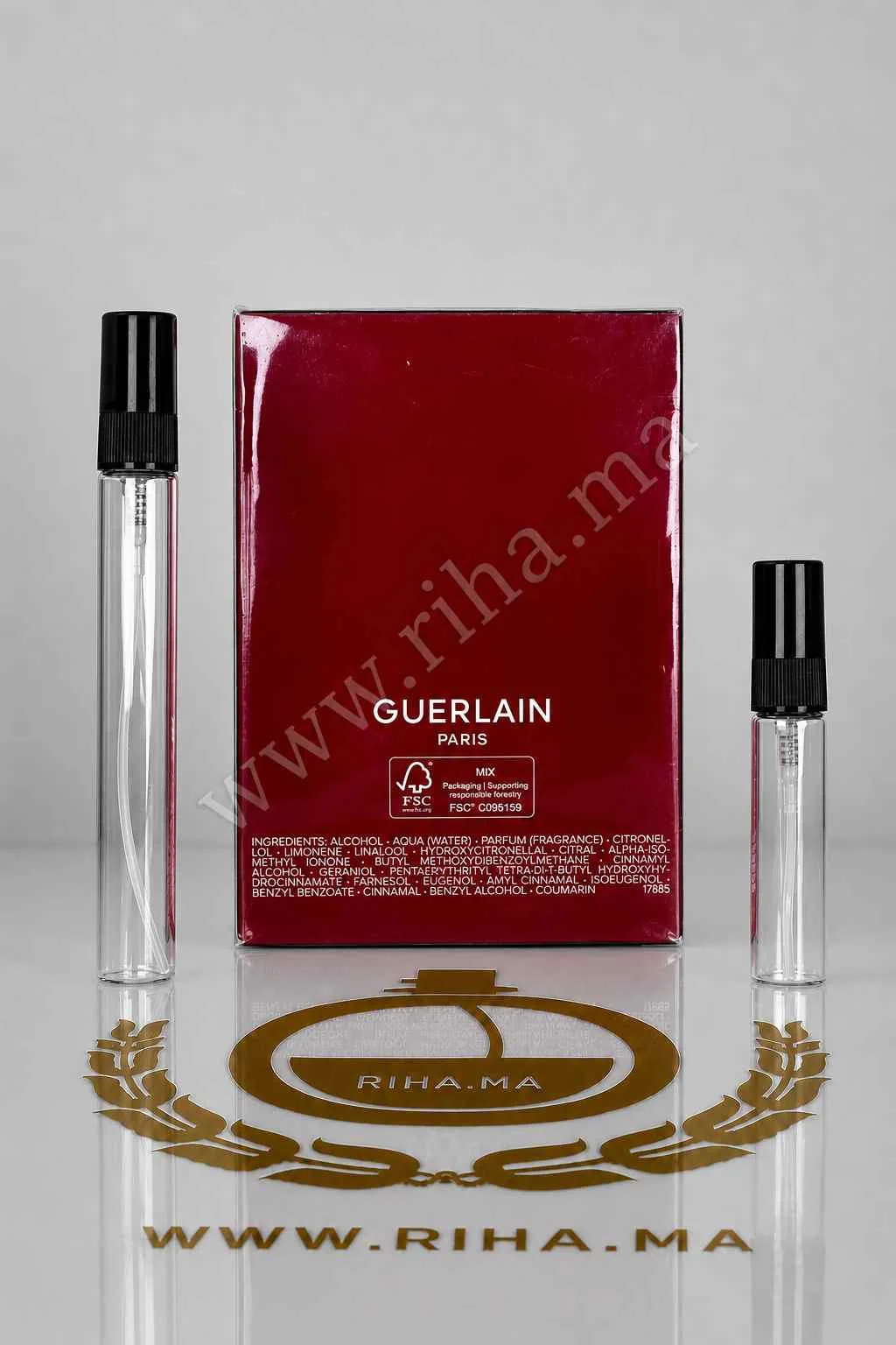 Decantage Habit Rouge Parfum Guerlain Pour Homme Authentic — photo 2 decantage habit rouge — Flacon de décantage Habit Rouge Parfum Guerlain pour homme sur fond noir — vue 2