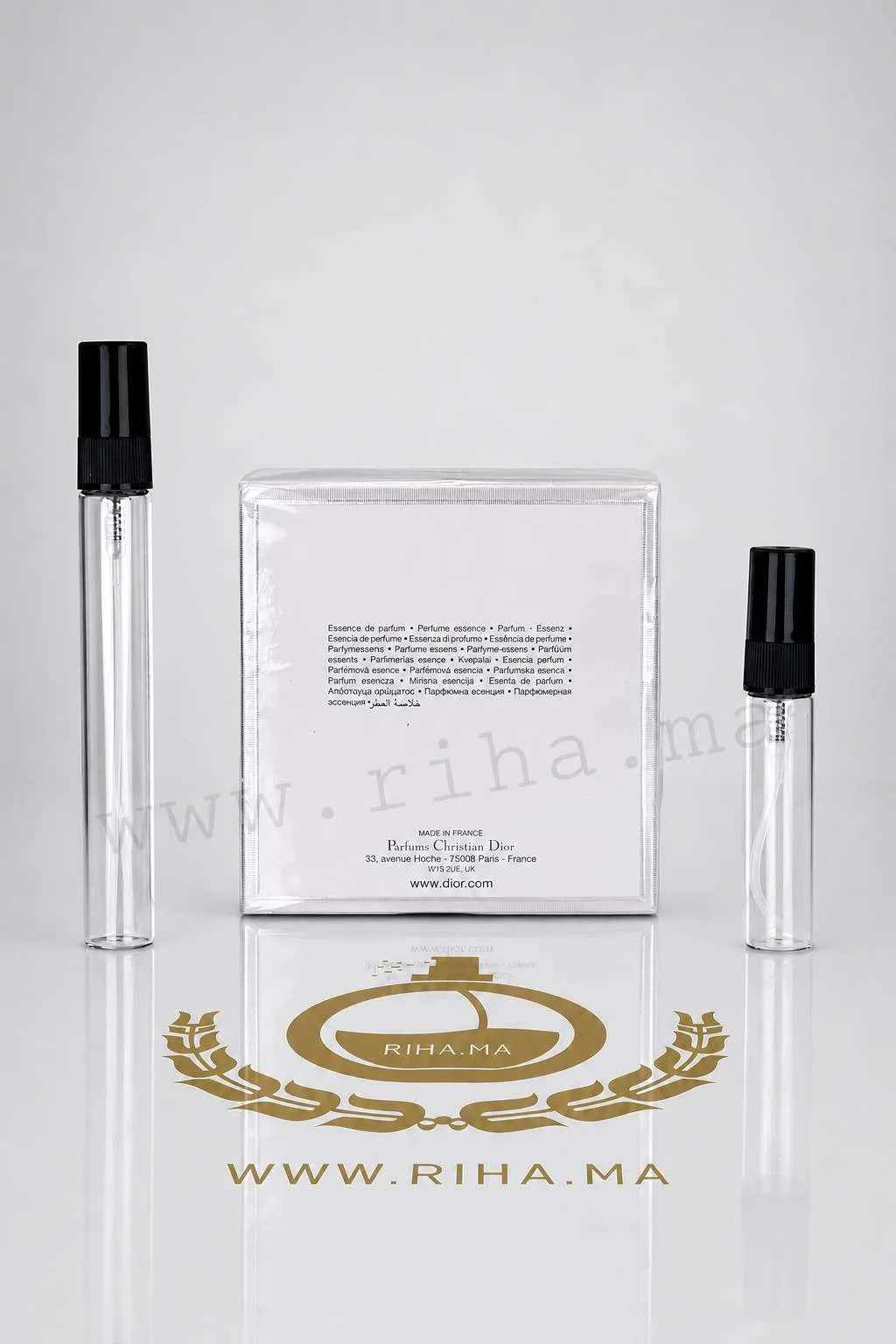 Decantage Miss Dior Essence Dior Pour Femme — photo 2 decantage miss dior essence dior — Flacon de décantage Miss Dior Essence Dior posé sur une table en marbre — vue 2