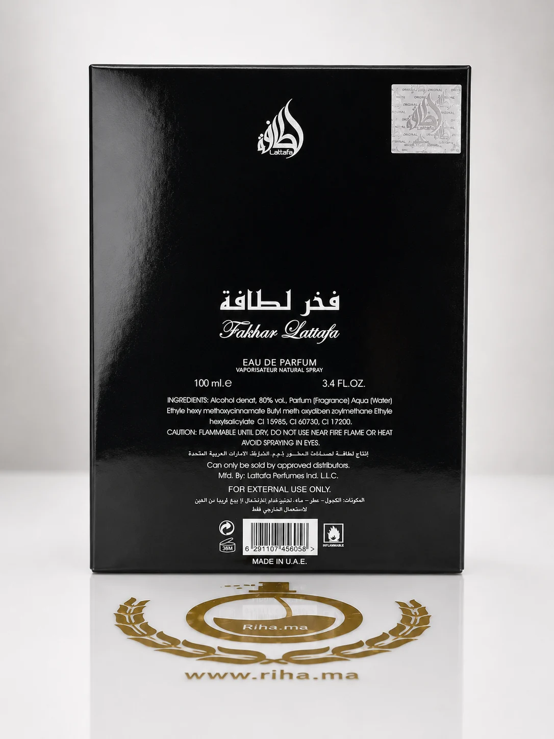 Fakhar Black Lattafa Perfumes Eau De Parfum pour homme 100ml — photo 2 Flacon de Fakhar Black Lattafa Perfumes posé sur fond sombre élégant — vue 2