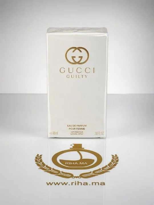 Gucci Guilty Pour Femme Eau de Parfum – 90ml Flacon de parfum Gucci Guilty sur fond élégant