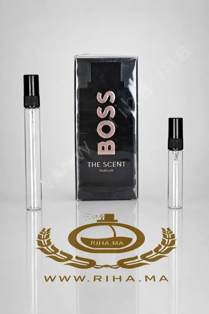 Decantage Boss The Scent For Him Magnetic Hugo Boss Le Parfum Pour Homme Authentic decantage boss the scent — Flacon de décantage Boss The Scent Magnetic posé sur fond noir élégant